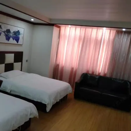 Xincai Wenshaman Business Hotel