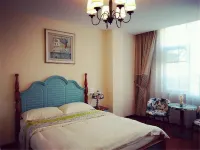 Luoping Huaying Image Theme Inn