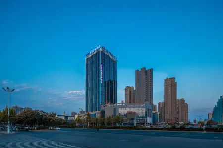 Kyriad Hotel (Shangqiu Municipal Government Wanda Plaza) Отели рядом с достопримечательностью «Shangqiu Polytechnic (Shenhuo Avenue)»
