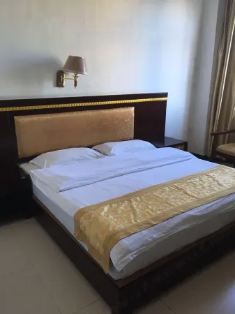 Gengma Yunhao Hotel Отели в г. Генма