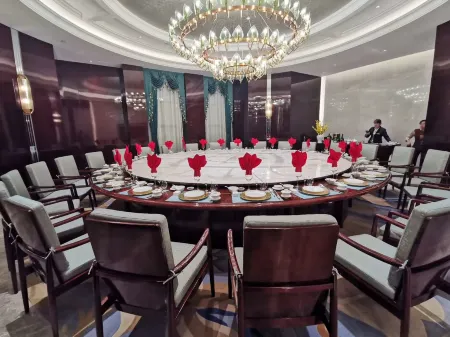 Pengfei Guobin Hotel Отели в г. Сяои