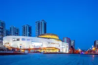 Mango Business Holiday Apartment (Dalian South China Plaza) Hotel in zona Technician Institute of Dalian Labor and Social Security Bureau