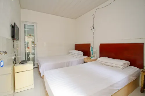 Fusheng Hostel - 인 (Inns)