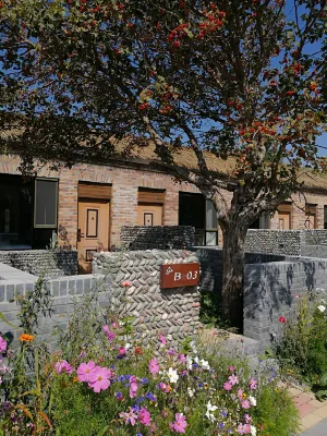 Xinyi Self-driving Camp Nalati East gate Отели рядом с достопримечательностью «Nalati National Forest Park»