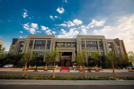 Changshen Yijiaren Hotel Отели рядом с достопримечательностью «Huanghe Square»