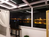 Jiayuguan Moluo Inn Hoteles en Jiayuguan