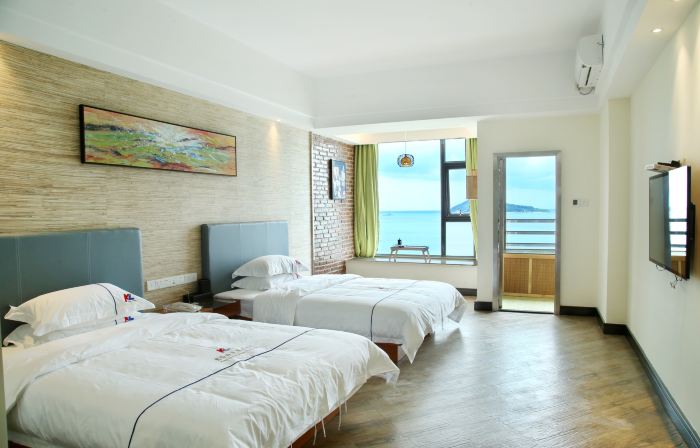 Junlin Seascape Holiday Hotel (Yangxi Shabawan Haitian Beach Branch)