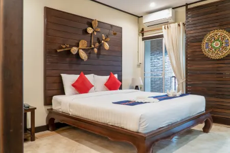 Sunny V Hotel Отели рядом с достопримечательностью «Wat Don Chan»