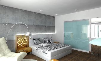 a modern bedroom with a large bed , hardwood floors , and a glass door leading to a balcony at Yellow Tree