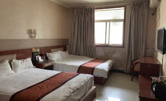 Zhouqu Home Inn Business Hotel