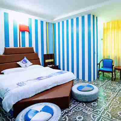 同旺賓館(興業興中路店) Rooms