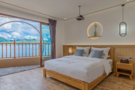 Lugu Lake Shuiyun Boutique Homestay Отели рядом с достопримечательностью «Dazu Pier»