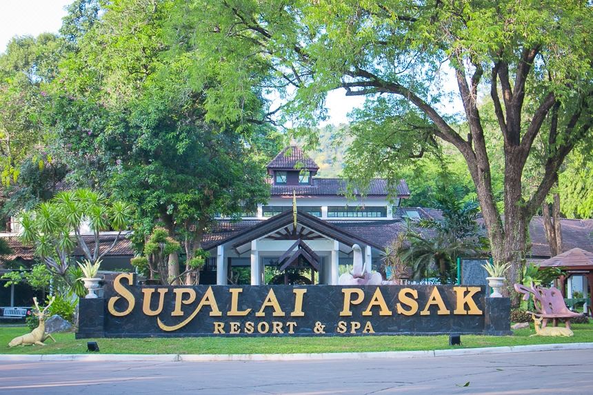 "a large building with a sign that reads "" supalai pasak resort & spa "" in front of it" at Supalai Pasak Resort Hotel and Spa