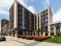 โรงแรมเรดดิงแมน (มหาวิทยาลัยเซี่ยงไฮ้ เจียวถัง) โรงแรมใกล้Shanghai Jiaotong University Minhang Campus Stadium