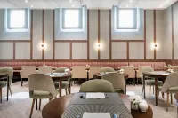 萊昂市長廣場NH系列酒店 - 早餐