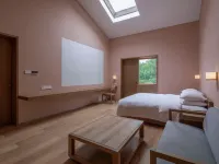 Longing Life Mushroom House Hostel Hotels in Huxiao Gorge