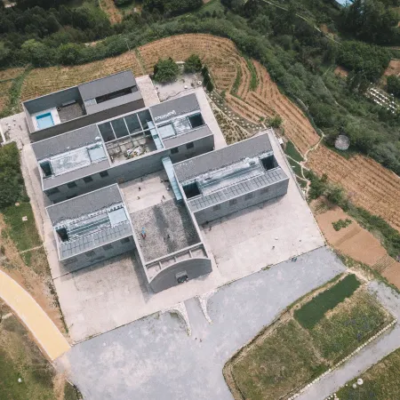 Yuchuan Jiushe Art Hotel