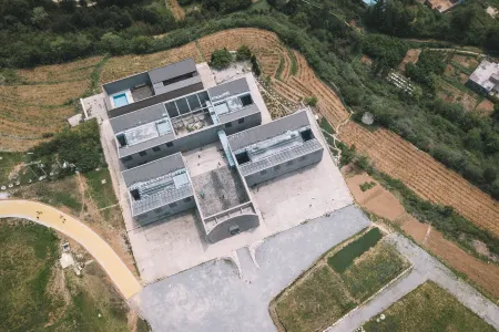 Yuchuan Jiushe Art Hotel Отели в г. Ланьтянь