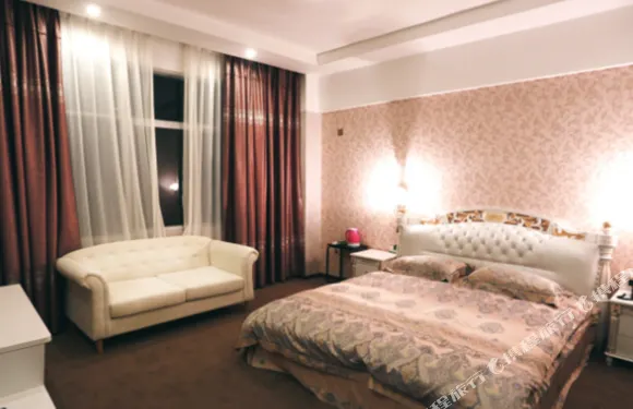 施甸金瑪主題酒店