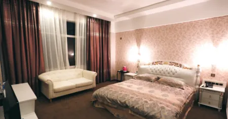 Shidian Jinma Theme Hotel Отели рядом с достопримечательностью «Qingniu Baima Square»