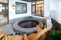 Mayu Qishe Hot Spring Holiday Hotel - 주차장