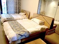 阳江海陵岛海明月度假公寓 - 依山伴海豪华双床房