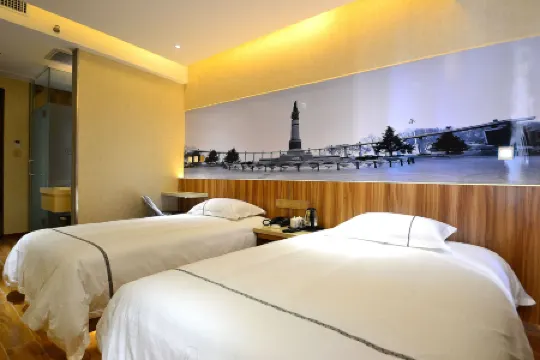 Henghe Chuntian Holiday Hotel Отели рядом с достопримечательностью «Zhou Enlai Forepart Harbin Develop Revolution Activity Domicile Relic Site»