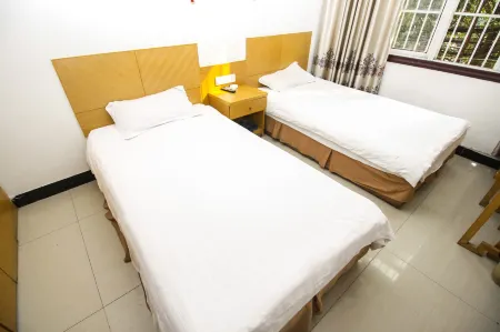 Tianyi Business Hotel Отели в г. Мэнчэн