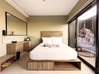 Cara Cara Inn Hoteles cerca de Centro comercial Kuta Square