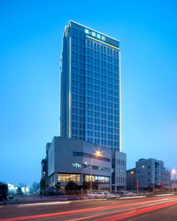 Kunshan Yusong International Hotel (Baimayu Road Subway Station) Отели рядом со станцией Yangcheng Lake Railway Station