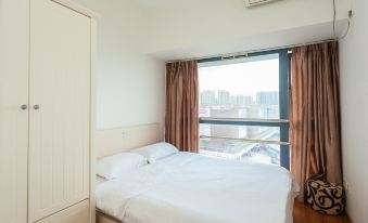 Shuangcheng E Jia Apartment Hotel