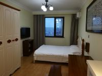 秦皇岛沿途风景观海公寓 - 温馨大床房