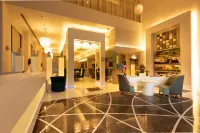 Clarens Hotel Отели в г. Гургаон