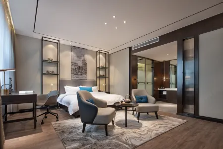 Xuchang Junyi Hote Отели рядом с достопримечательностью «Qingyihe Thousand Acres Garden»