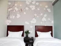 华驿酒店(北京平谷大马环岛店) - 高级双床间