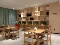 Bella Hotel (Dongying Guangrao Le'an Street International Expo Center) - С тренажерным залом
