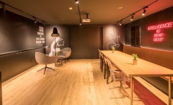 a desk and a chair, providing a comfortable and functional work area at CitiGO Hotel Sanyuanqiao Beijing