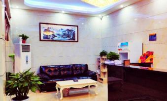 Taojiang Qijia Business Hotel