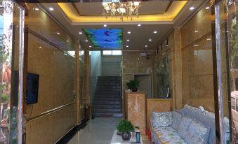 Yuanmou Aiweike Business Hotel