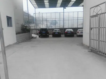 Baokang Shoujia Business Hotel Отели рядом со станцией Baokangxian Railway Station