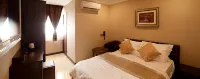 วาเลนซาโฮเทลแอนด์คาเฟ่ - บ้านพักหลังเล็ก