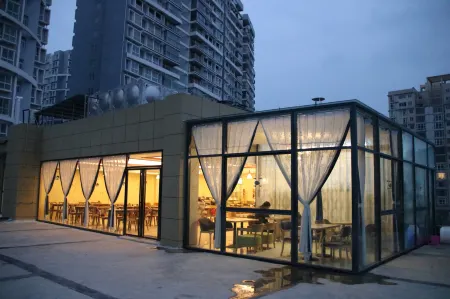 Xinyi Hotel Отели рядом с достопримечательностью «Xingyi Normal University for Nationalities West Campus»