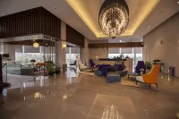 Huatian Hotel Hotel di Jiahe