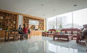 Yawan Impression Business Hotel (Songyuan Jinjiang Street store)