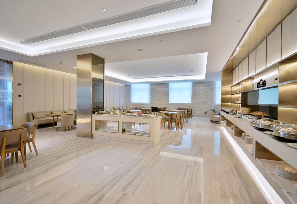 지 호텔 항저우 샤오산 에어포트 애비뉴의 깔끔한 객실 이미지