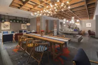 Qianna Hotel (Xinxiang Hualan Avenue Pangdonglai Shopping Plaza)