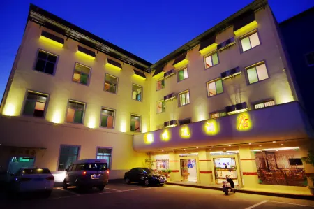 Xin hong yun hotel Отели рядом с достопримечательностью «Longchuan Gymnasium»