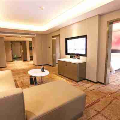 萬頤大酒店(欽州東站長融世貿廣場店) Rooms