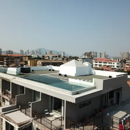 Manju Wuwen Dongxi Hostel Отели рядом с достопримечательностью «Монастырь Кайюань»