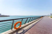Yunhai Bay Ocean View LOFT Holiday Residence (Jinmao Mall, Qingdao Station) โรงแรมใกล้สถานีรถไฟชิงเต่า